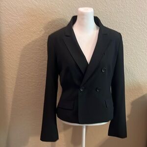 Express fully lined women’s black short blazer.EUC